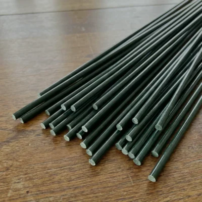 Schwingstäbe für Sonnenfänger auf einem Tisch, D3x 600 mm, grün